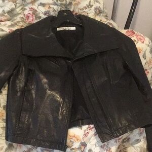 Women's Black Leather cropped Jacket It has great zipper details throughout